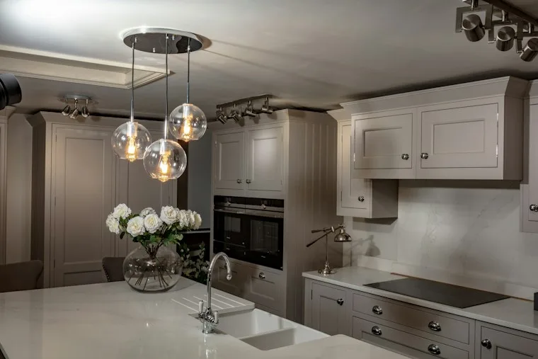 Large luxury kitchen with a center island and a chandelier