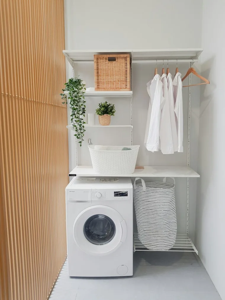 Laundry room with a washer and dryer side by side
