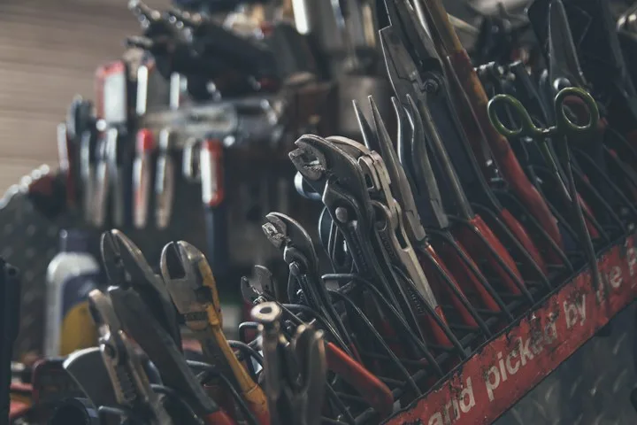 Set of technician repair tools laid out and ready for a service call
